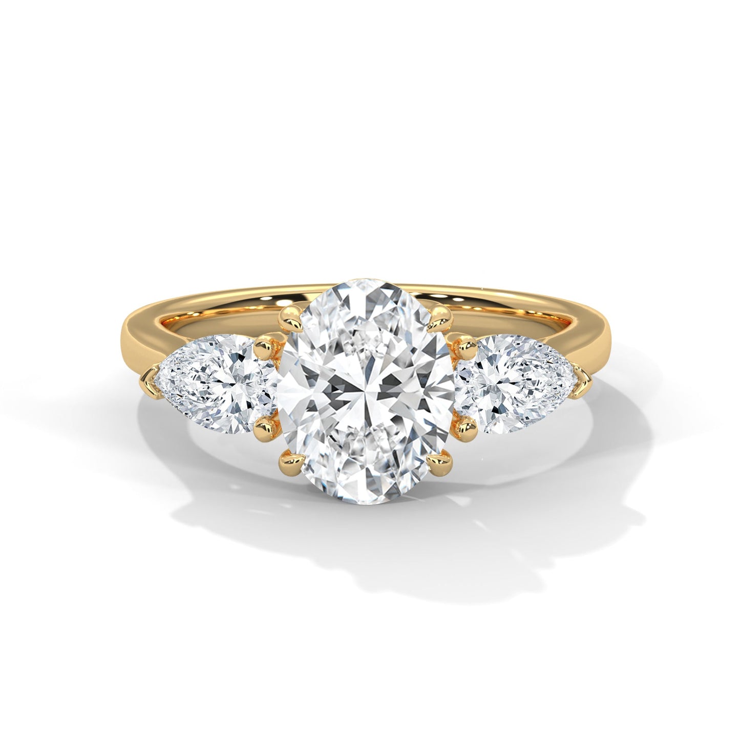 elegant oval-cut three-stone diamond engagement ring with pear side stones