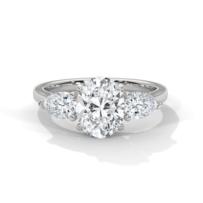 Elegant Oval-Cut Three-Stone Diamond Engagement Ring with Pear Side Stones