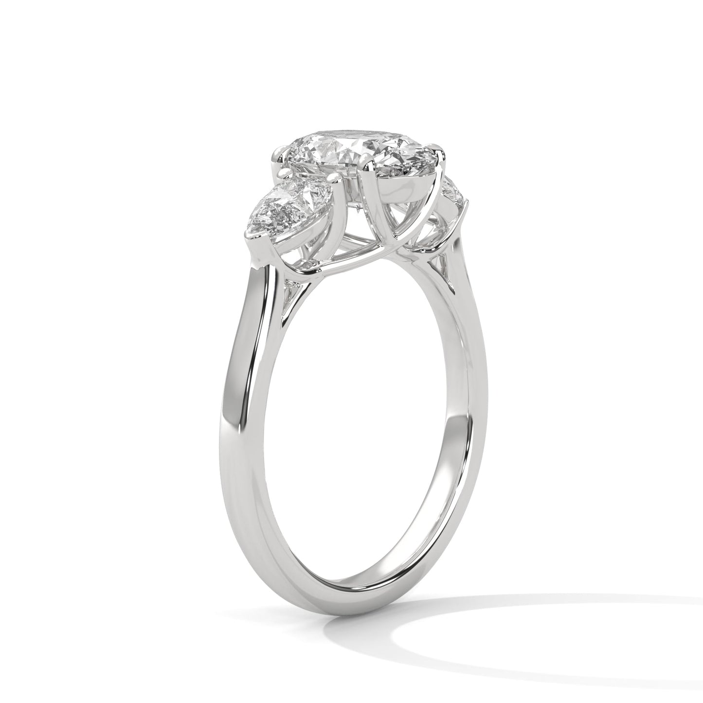 elegant oval-cut three-stone diamond engagement ring with pear side stones